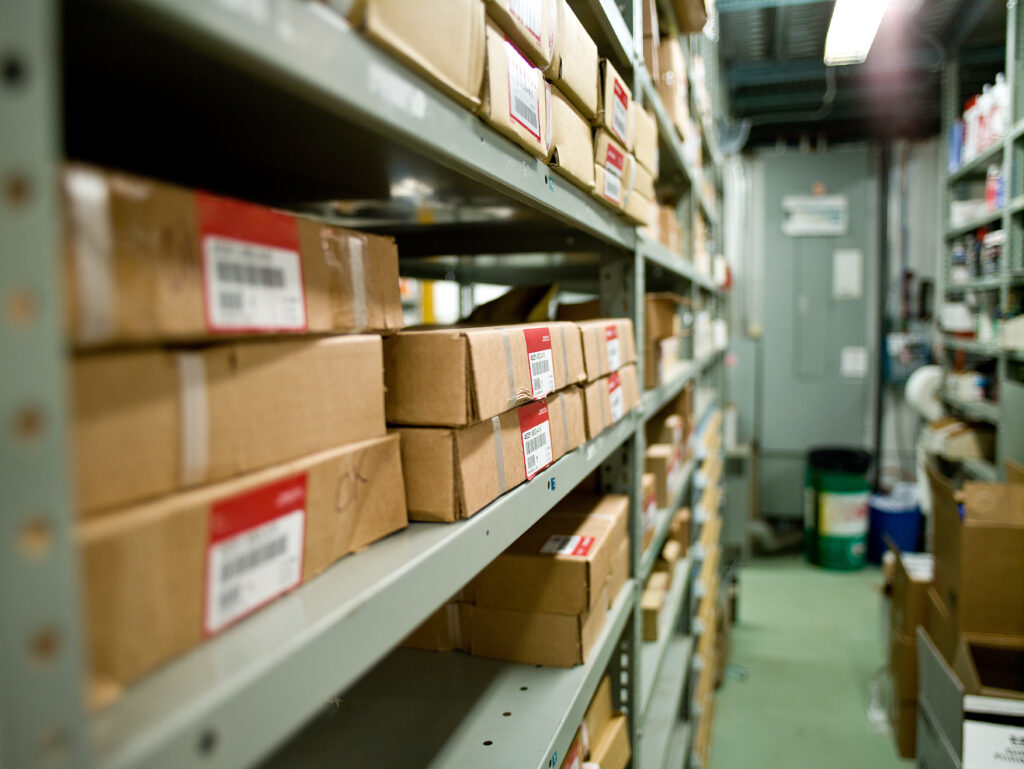 Boxes on shelves in warehouse